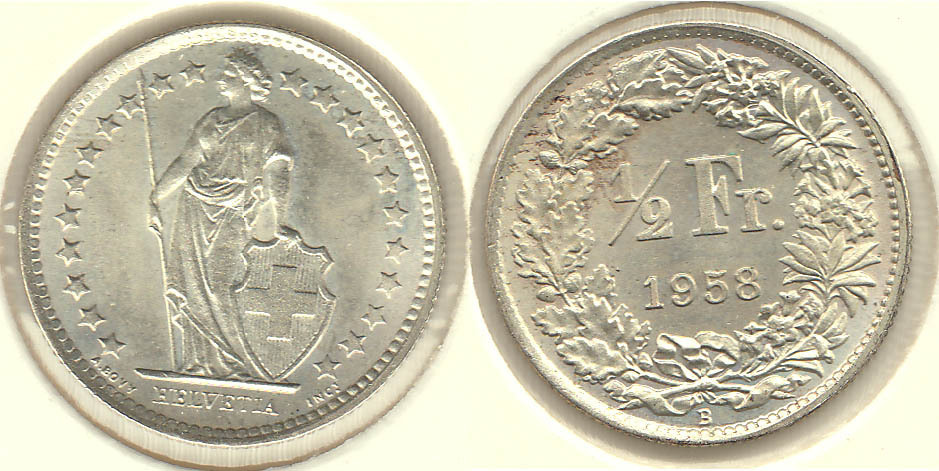 SUIZA - SWITZERLAND. 1/2 FRANCO (FRANC) DE 1958. PLATA 0.835. (2)